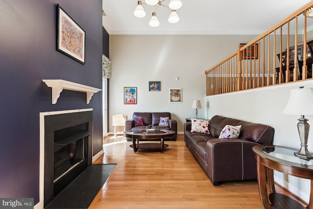3814 Woodlawn Ct, Alexandria, VA 22304 - living room with a fireplace with flush hearth, ornamental molding, wood finished floors, and a towering ceiling