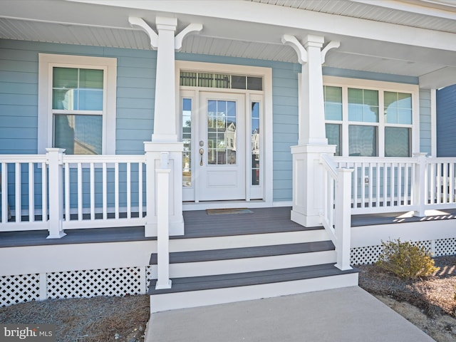 entrance to property with covered porch