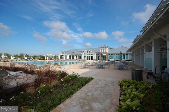 community pool with a patio