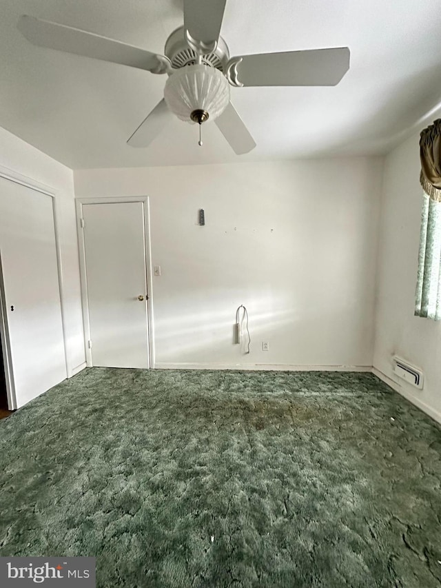 1224 Sheridan Ave, Baltimore, MD 21239 - spare room with baseboards, ceiling fan, and carpet floors