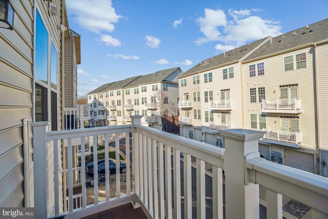 balcony featuring a residential view