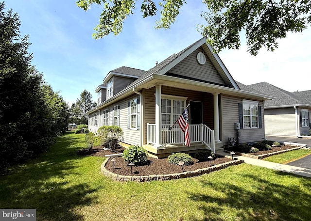 view of front of house featuring a porch and a front yard