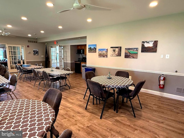 dining space with ceiling fan, visible vents, wood finished floors, baseboards, and recessed lighting