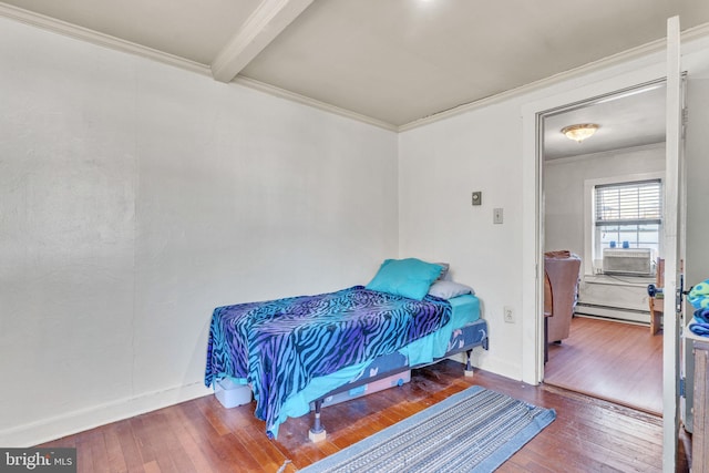 bedroom with wood-type flooring, cooling unit, crown molding, and a baseboard heating unit