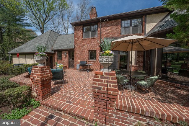 view of patio with outdoor dining area