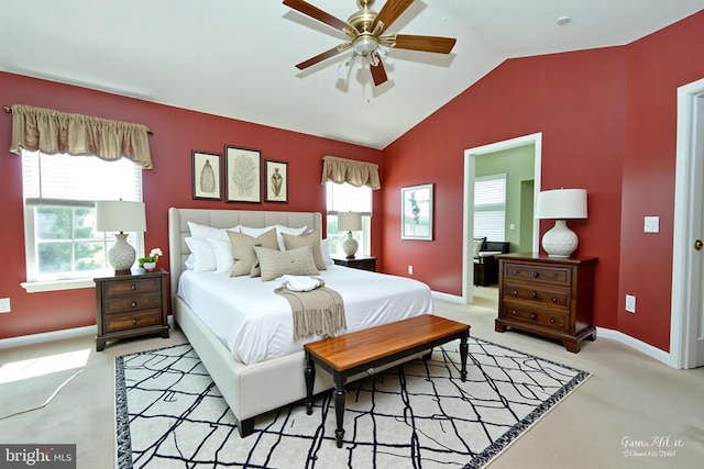 bedroom featuring lofted ceiling, carpet flooring, and baseboards