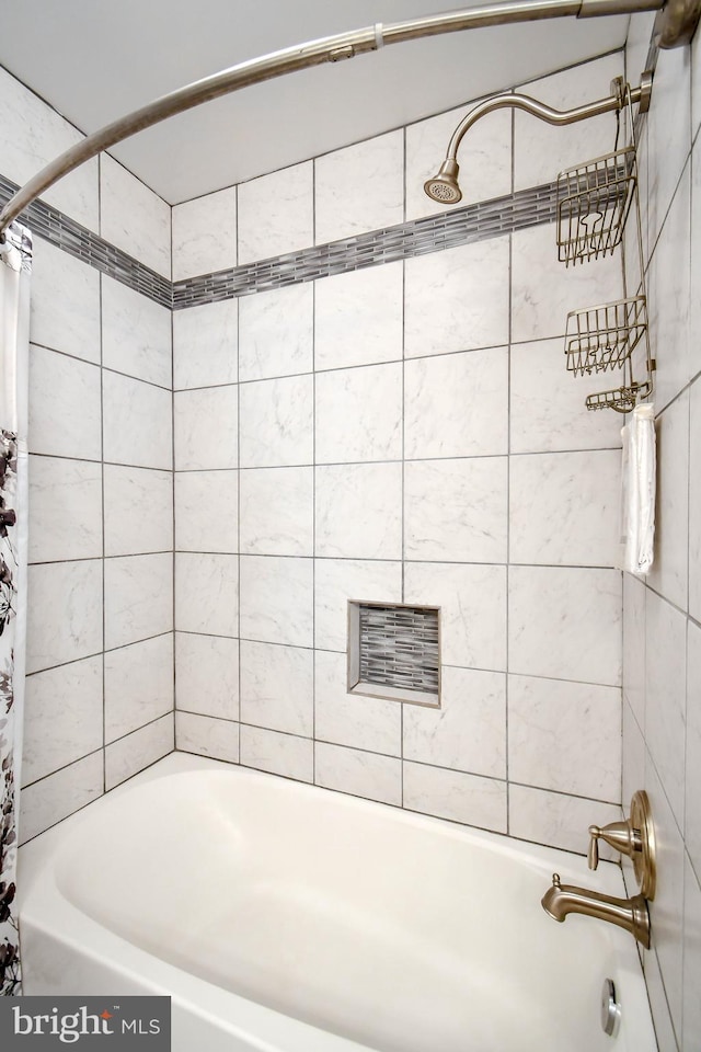full bathroom featuring shower / bathtub combination with curtain