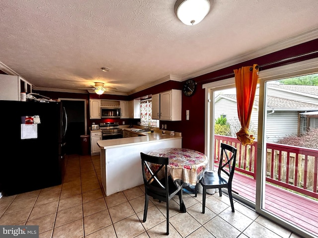 kitchen featuring stainless steel appliances, crown molding, a peninsula, a textured ceiling, and ceiling fan