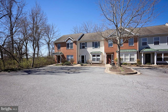 multi unit property featuring brick siding