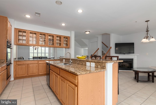 2804 Persimmon Pl Unit D3, Cambridge, MD 21613 - kitchen with glass insert cabinets, light tile patterned floors, a sink, open floor plan, and black appliances