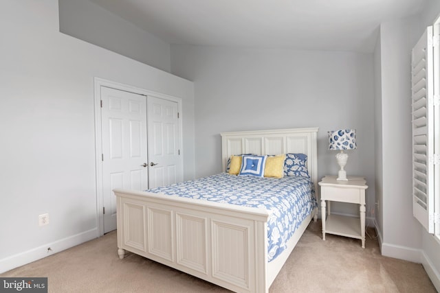 2804 Persimmon Pl Unit D3, Cambridge, MD 21613 - bedroom with light carpet, a closet, and baseboards