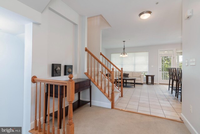 2804 Persimmon Pl Unit D3, Cambridge, MD 21613 - stairs with baseboards, tile patterned flooring, and carpet floors