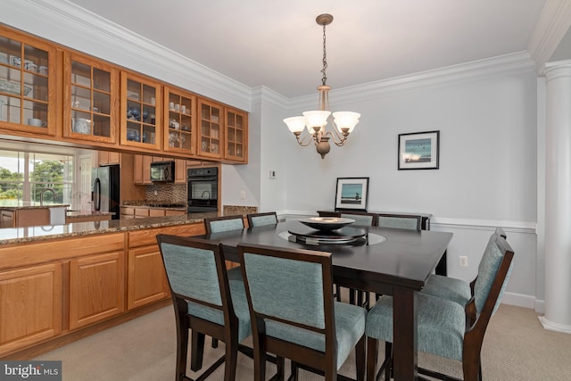 2804 Persimmon Pl Unit D3, Cambridge, MD 21613 - dining room with light carpet, crown molding, decorative columns, and a notable chandelier