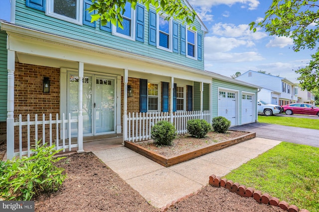 19916 Westerly Ave, Poolesville, MD 20837 - doorway to property with a porch and brick siding