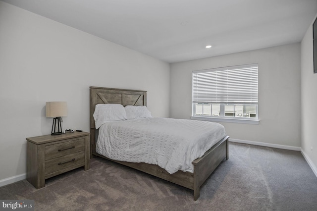 bedroom with baseboards, dark carpet, and recessed lighting