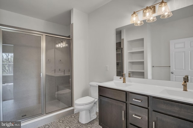 907 Shadowbrooke Dr, Dover, PA 17315 - bathroom featuring a sink, toilet, and a stall shower