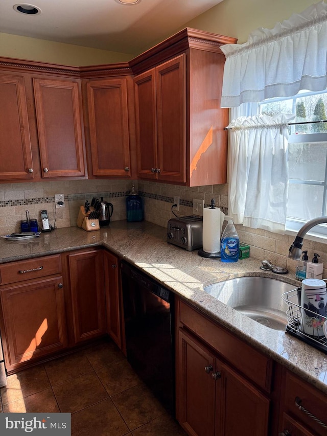 2703 Branch Pike, Cinnaminson, NJ 08077 - kitchen with brown cabinetry, decorative backsplash, dishwasher, a sink, and dark tile patterned flooring