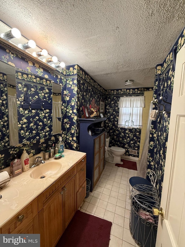 2703 Branch Pike, Cinnaminson, NJ 08077 - full bath featuring a textured ceiling, vanity, toilet, tile patterned floors, and wallpapered walls