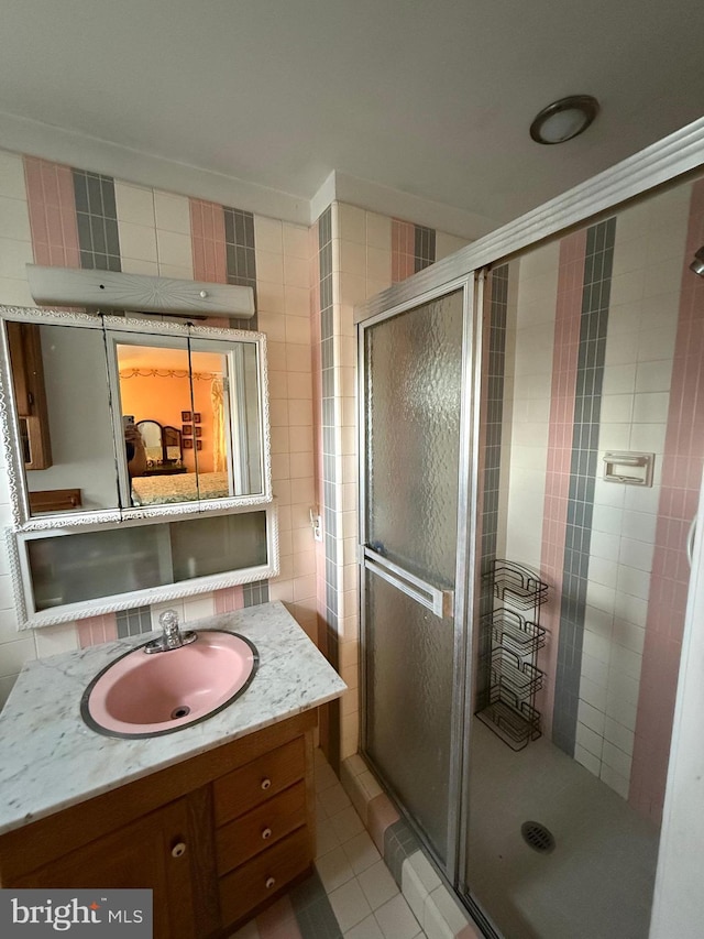 2703 Branch Pike, Cinnaminson, NJ 08077 - bathroom with a stall shower, vanity, tile patterned flooring, and tile walls
