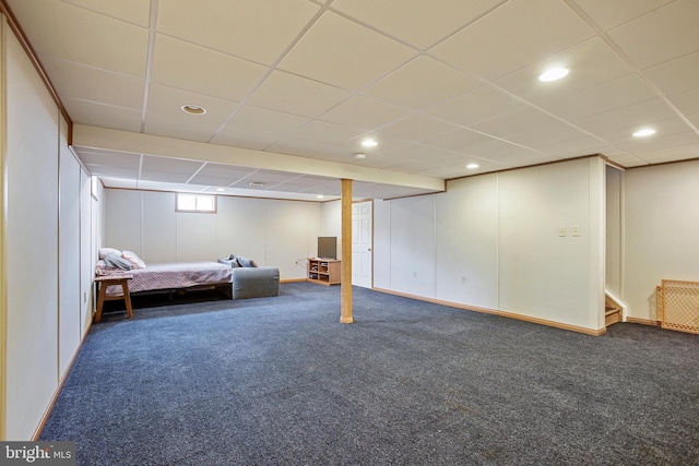 unfurnished bedroom with recessed lighting, carpet, and a paneled ceiling