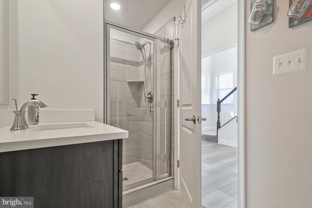 33273 Claremont Ct, Millsboro, DE 19966 - full bathroom featuring baseboards, a stall shower, and vanity