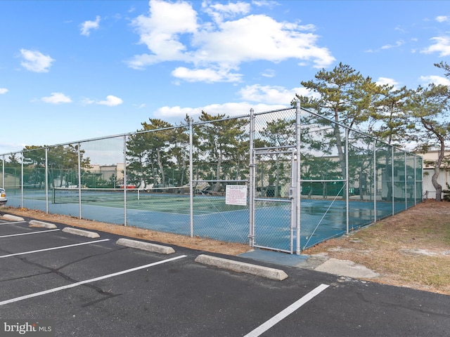 105 120th St Unit 168, Ocean City, MD 21842 - view of tennis court with a gate and fence