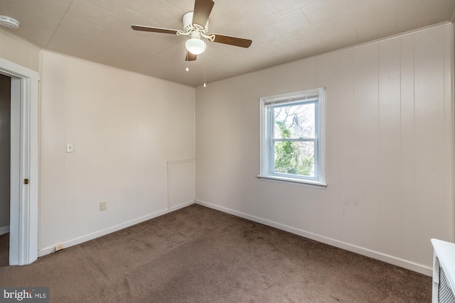 unfurnished room with baseboards, carpet floors, and ceiling fan