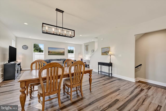 10031 Whitaker Way, Parkville, MD 21234 - dining space featuring baseboards, recessed lighting, wood finished floors, and a notable chandelier