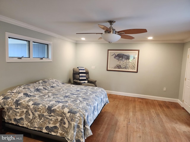 bedroom featuring ornamental molding, baseboards, recessed lighting, and light wood-style floors