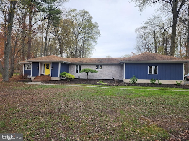 ranch-style home with crawl space and a front lawn