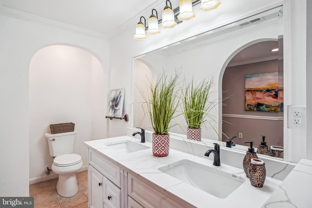 full bathroom with toilet, a sink, and ornamental molding