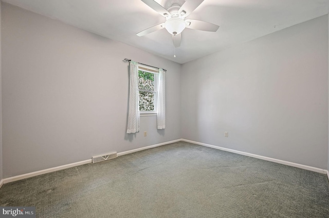 empty room featuring visible vents, baseboards, ceiling fan, and carpet floors