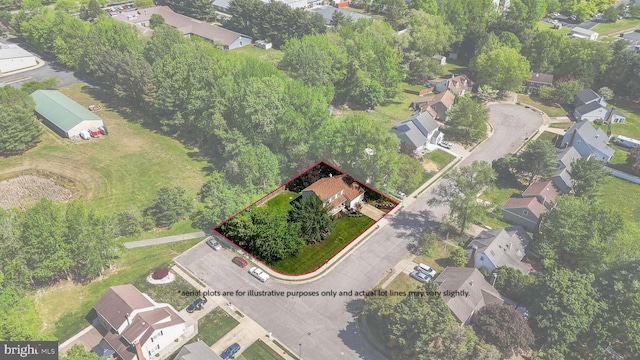 birds eye view of property with a residential view