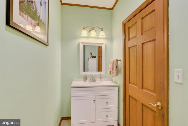 1205 Bridge St, New Cumberland, PA 17070 - bathroom featuring baseboards, ornamental molding, and vanity