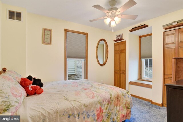1205 Bridge St, New Cumberland, PA 17070 - carpeted bedroom featuring baseboards, visible vents, and a ceiling fan