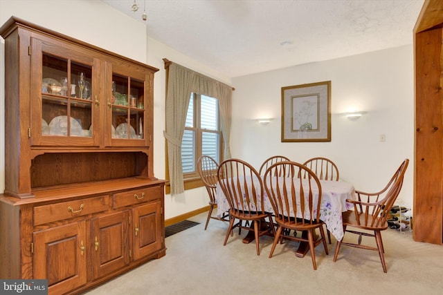 1205 Bridge St, New Cumberland, PA 17070 - dining area with light colored carpet, visible vents, and baseboards