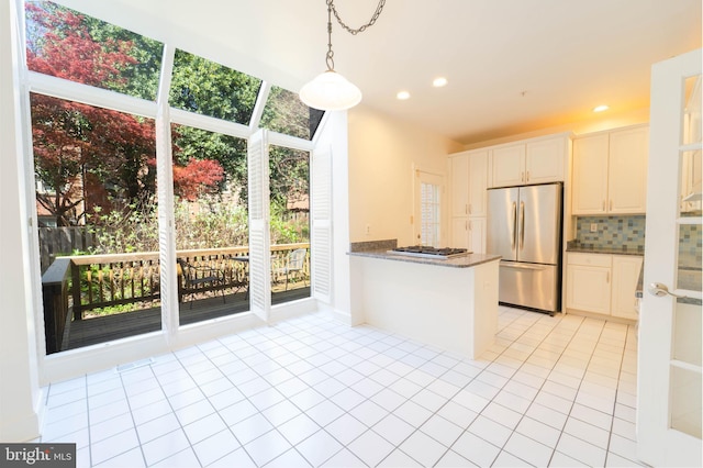 6038 Kelsey Ct, Falls Church, VA 22044 - kitchen featuring recessed lighting, stainless steel appliances, backsplash, pendant lighting, and light tile patterned flooring