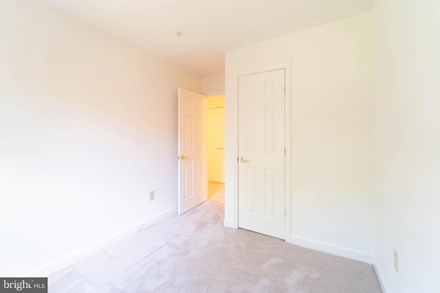 6038 Kelsey Ct, Falls Church, VA 22044 - unfurnished bedroom with light colored carpet and baseboards