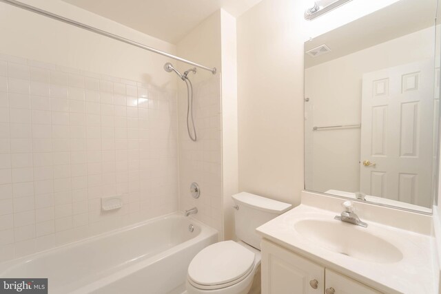 6038 Kelsey Ct, Falls Church, VA 22044 - bathroom with washtub / shower combination, vanity, visible vents, and toilet