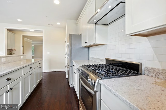 5919-2 Logans Way Unit 2, Ellicott City, MD 21043 - kitchen with stainless steel range with gas stovetop, under cabinet range hood, white cabinetry, dark wood-style floors, and recessed lighting