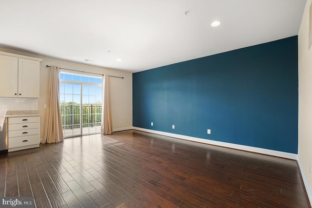 5919-2 Logans Way Unit 2, Ellicott City, MD 21043 - empty room with dark wood-style flooring, baseboards, fire sprinkler in ceiling, and recessed lighting