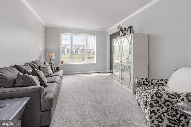 living area featuring ornamental molding, carpet flooring, and baseboards