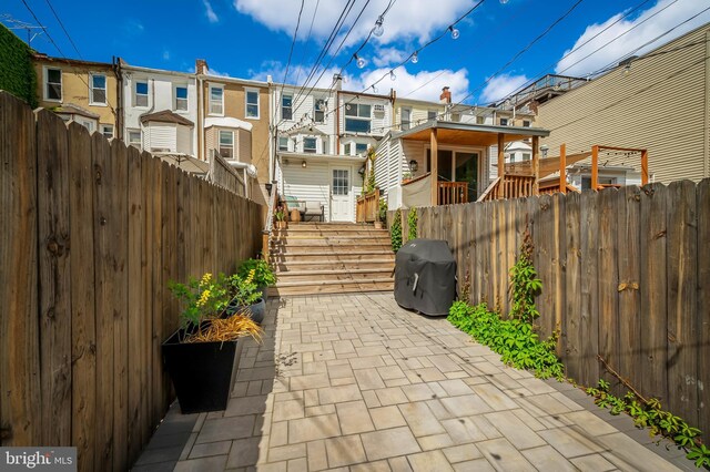 view of patio / terrace featuring fence and area for grilling