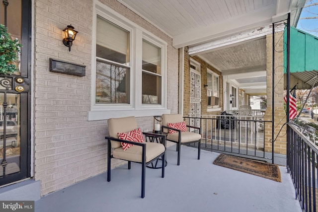 view of patio featuring a porch