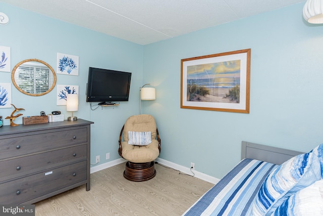 11500 Coastal Hwy Unit 317, Ocean City, MD 21842 - bedroom with wood finished floors and baseboards
