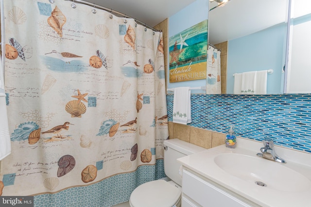 11500 Coastal Hwy Unit 317, Ocean City, MD 21842 - bathroom featuring curtained shower, toilet, tile walls, vanity, and backsplash