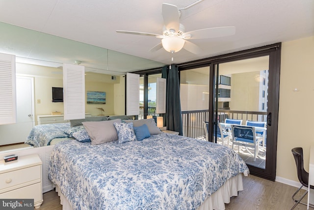 11500 Coastal Hwy Unit 317, Ocean City, MD 21842 - bedroom featuring light wood-style flooring, access to exterior, baseboards, and ceiling fan