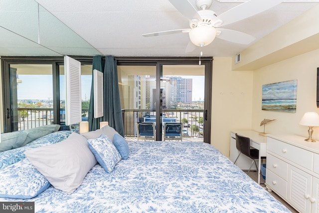 11500 Coastal Hwy Unit 317, Ocean City, MD 21842 - bedroom with access to exterior, floor to ceiling windows, and visible vents