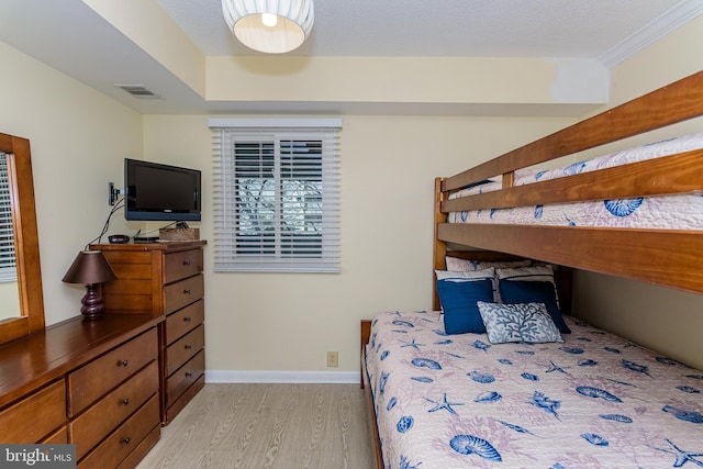 11500 Coastal Hwy Unit 317, Ocean City, MD 21842 - bedroom featuring light wood-style flooring, baseboards, and visible vents