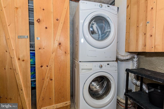 11500 Coastal Hwy Unit 317, Ocean City, MD 21842 - washroom with laundry area and stacked washer / drying machine